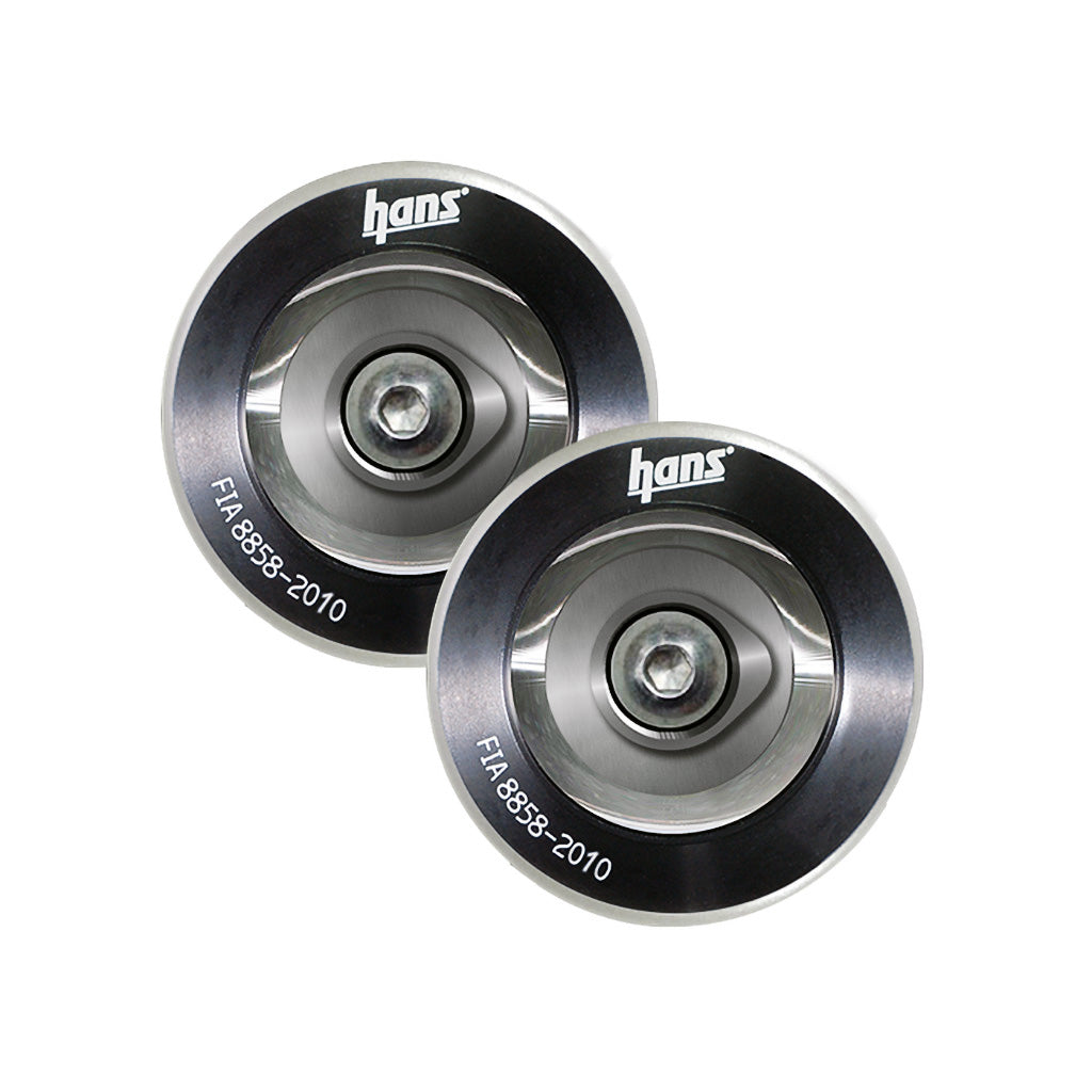 Pair of black HANS post anchors mounted on a racing helmet