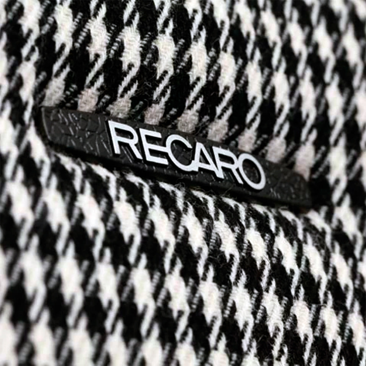 Recaro_Classic_Pole_Position_Seat_ABE_Seat_Black-Leather_Pepita-Fabric-closeup-logo_Image