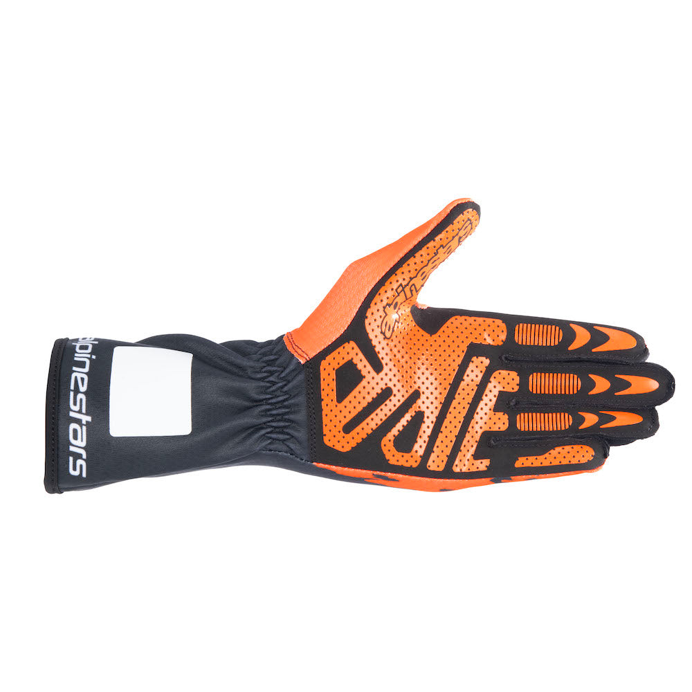The Alpinestars Tech-1 K v3 Gloves in action, highlighting their superior grip and dexterity for the modern kart racer.