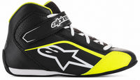 Thumbnail for Alpinestars high-top racing shoe in black with neon yellow and white accents, featuring a white Alpinestars star logo on the side and a white Alpinestars brand strap across the ankle.