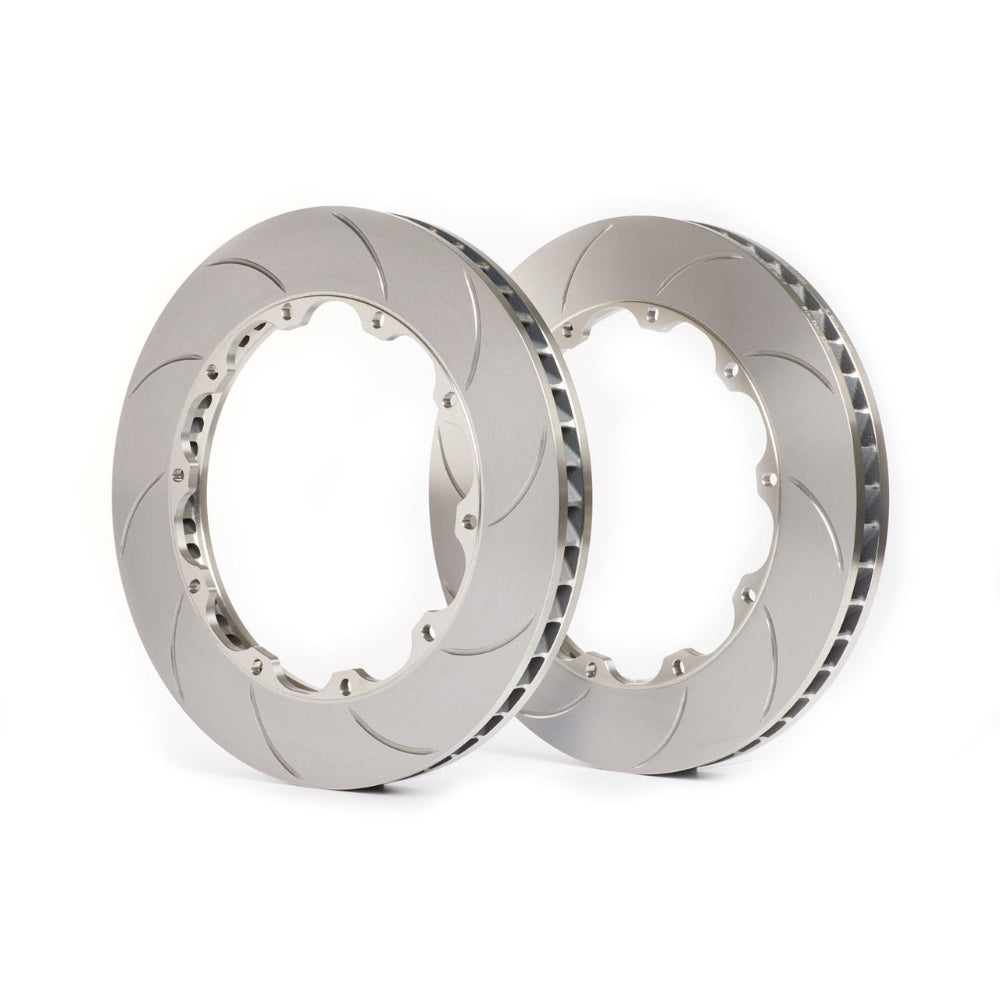 Two metallic brake rotors on a white background
