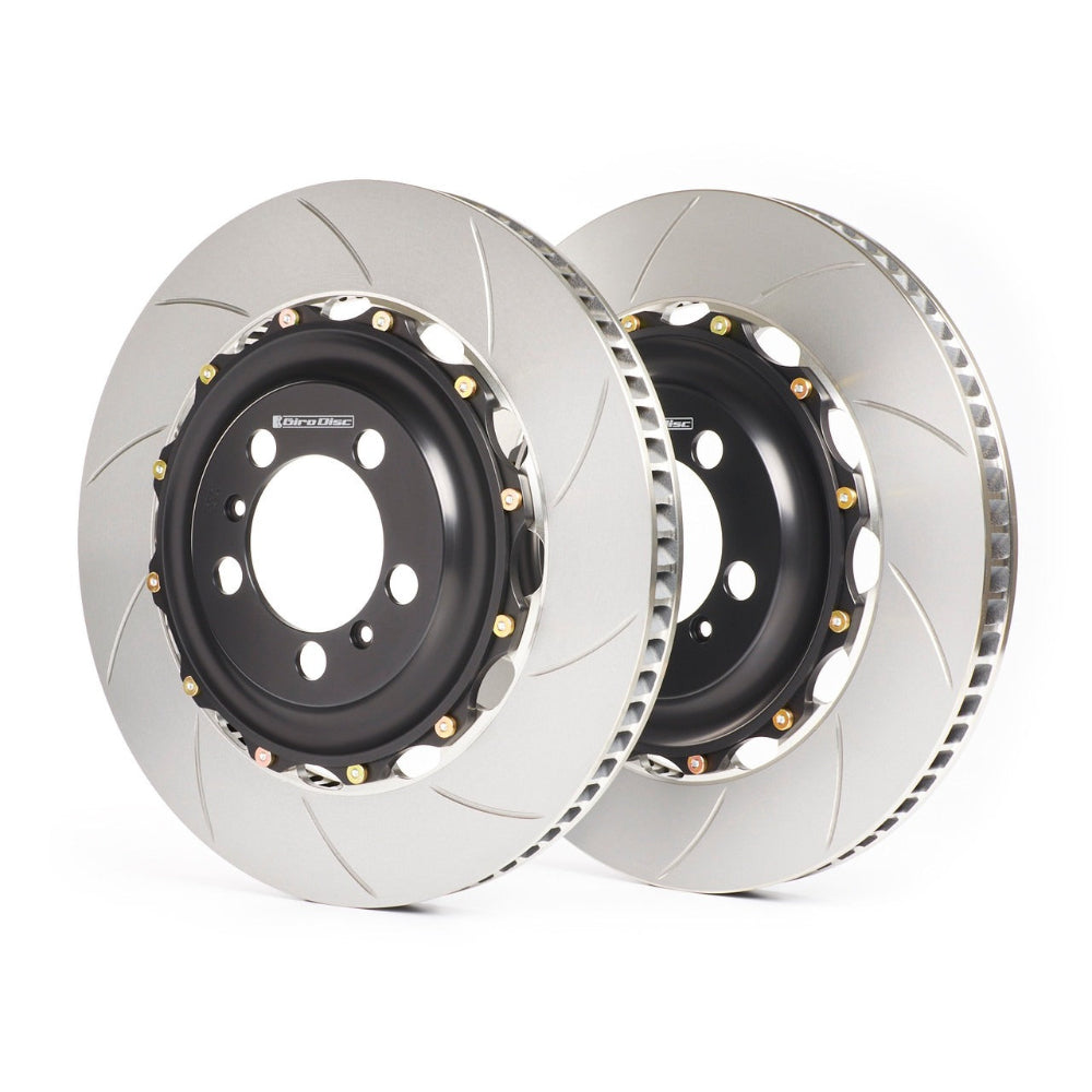 Two brake rotors on a white background