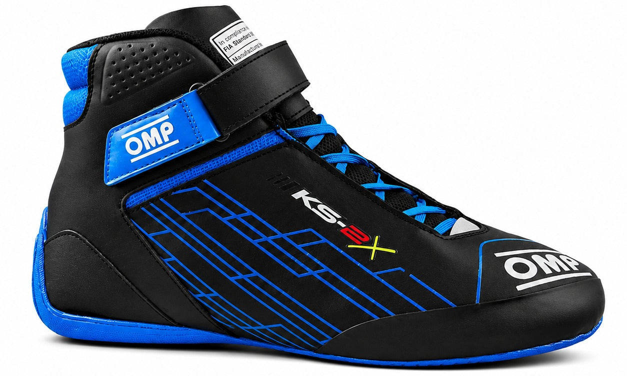 OMP KS-2X kart racing shoe in black and blue, shown in a straight right-facing side view on a white background.