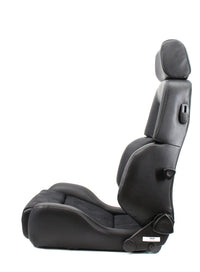 Thumbnail for A Recaro Expert  hero image  leather car bucket seat with a headrest and side adjustment controls, shown in profile against a solid white background.