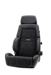 Thumbnail for A black Recaro car seat with a textured leather and suede-like center panel, shown from a three-quarter angle on a white background.