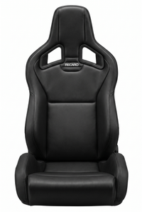 Thumbnail for A black leather Recaro racing bucket seat with a high back, side bolsters, and cutout headrest, shown against a plain white background.