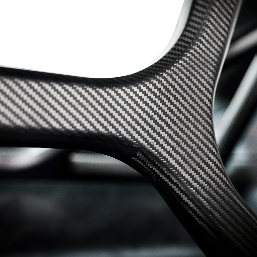 Close-up of seamless carbon fiber weave on SilverRocket 992 roll cage

