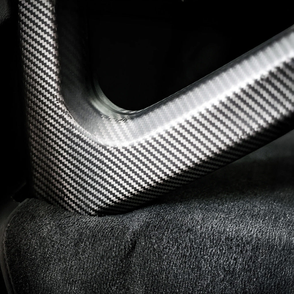 Detailed image of SilverRocket roll cage mounting system in Porsche 992

