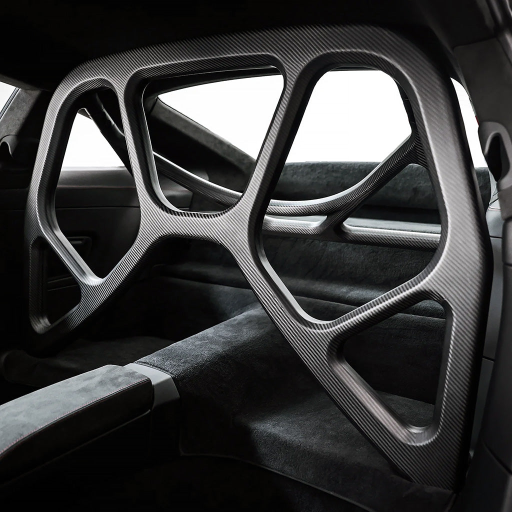 SilverRocket seamless carbon fiber roll cage installed in Porsche 992 GT3 interior

