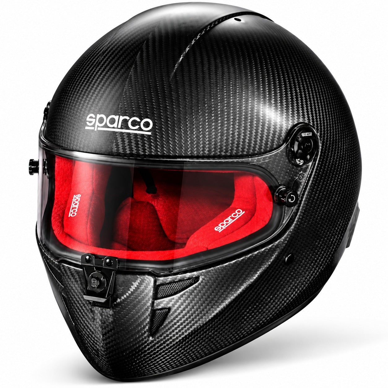 Sparco Stealth KF Carbon Fiber karting helmet featuring exposed black carbon fiber shell, clear visor, red interior padding, chin ventilation, and Sparco branding.