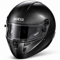 Thumbnail for Sparco Stealth KF Carbon Fiber karting helmet featuring exposed black carbon fiber shell, clear visor, red interior padding, chin ventilation, and Sparco branding.