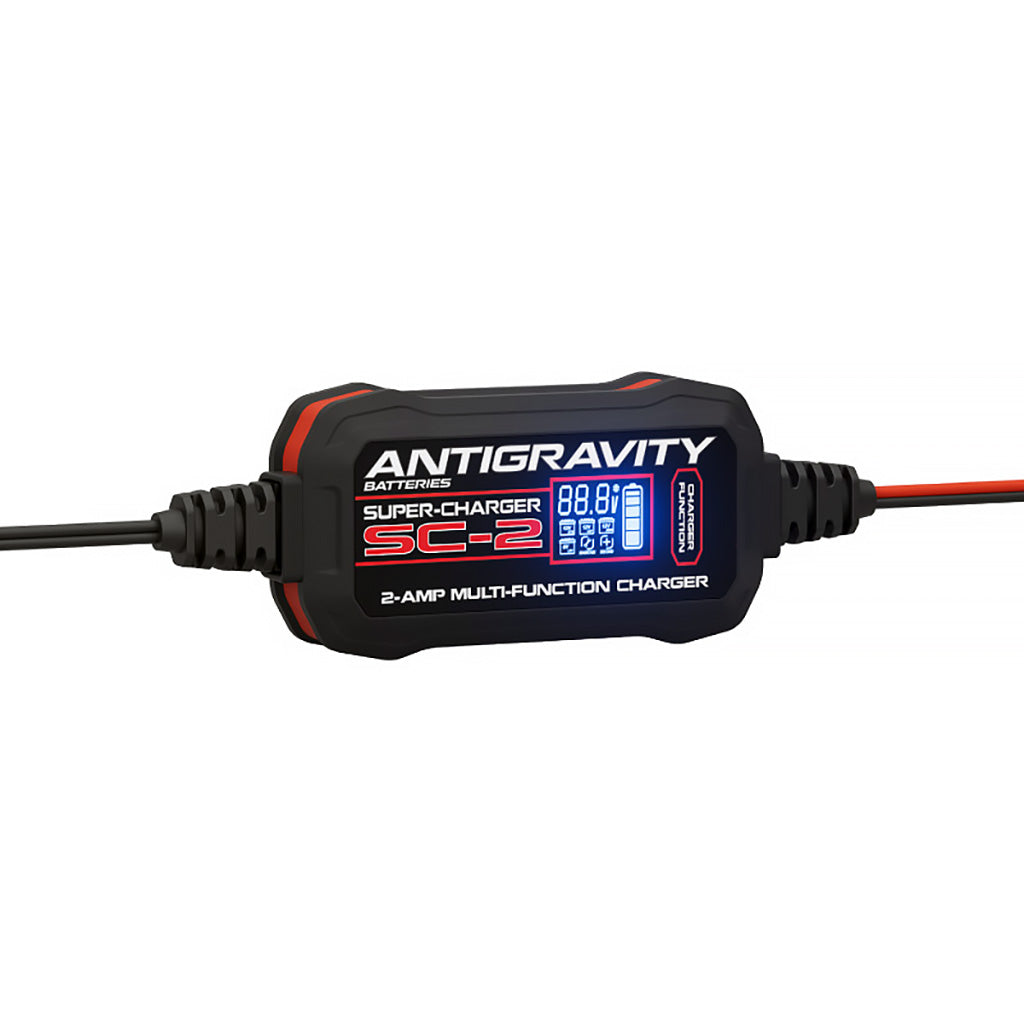 Compact Antigravity SC-2 battery charger with LCD display showing charge status