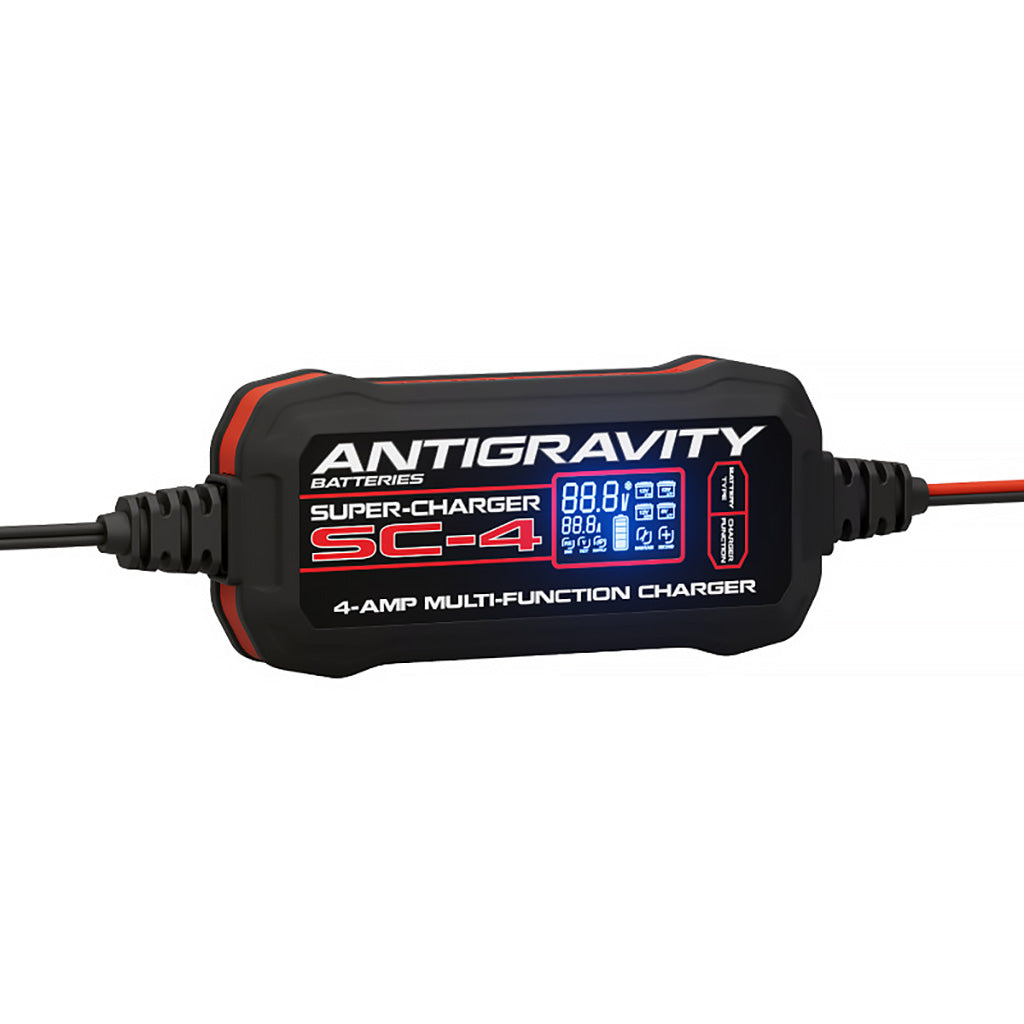 Compact Antigravity SC-4 battery charger with LCD display showing charge status