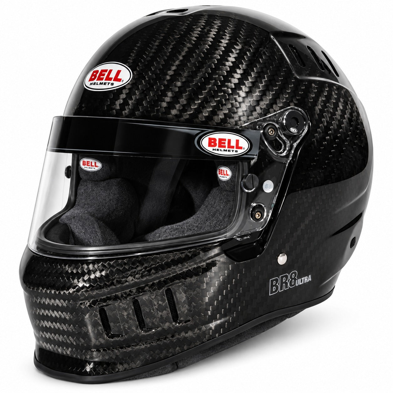 Bell BR8 ULTRA Carbon Fiber Auto Racing Helmet in gloss carbon fiber, shown in front three-quarter view with clear anti-fog visor, front ventilation ports, and lightweight carbon shell. Snell SA2025 certified.