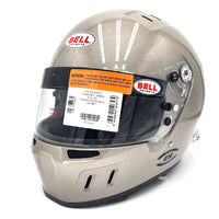 Thumbnail for Close-up of Bell GT6 RD 4C EC helmet in titanium finish with barcode label and SNELL/FIA certifications