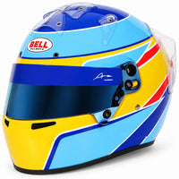 Thumbnail for Bell KC7-CMR Fernando Alonso youth karting helmet featuring blue and yellow Formula 1-inspired graphics, blue multi-layer visor, clear air intakes, and aerodynamic rear spoiler.