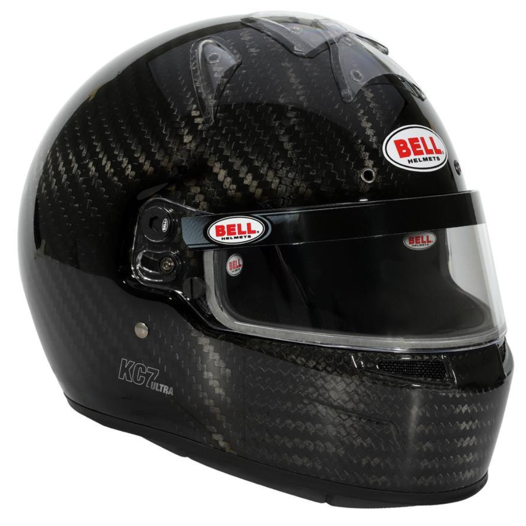 Angled front right view of Bell KC7 CMR Ultra Carbon youth karting helmet