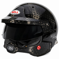 Thumbnail for Bell MAG-10 Rally Ultra carbon fiber racing helmet shown from the front three-quarter angle on a white background