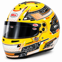 Thumbnail for Bell RS7-K Pro Stamina karting helmet in Anthracite/Yellow featuring bright yellow, black, gray, and orange racing graphics, lightweight composite shell, and SE07 3mm anti-fog visor.