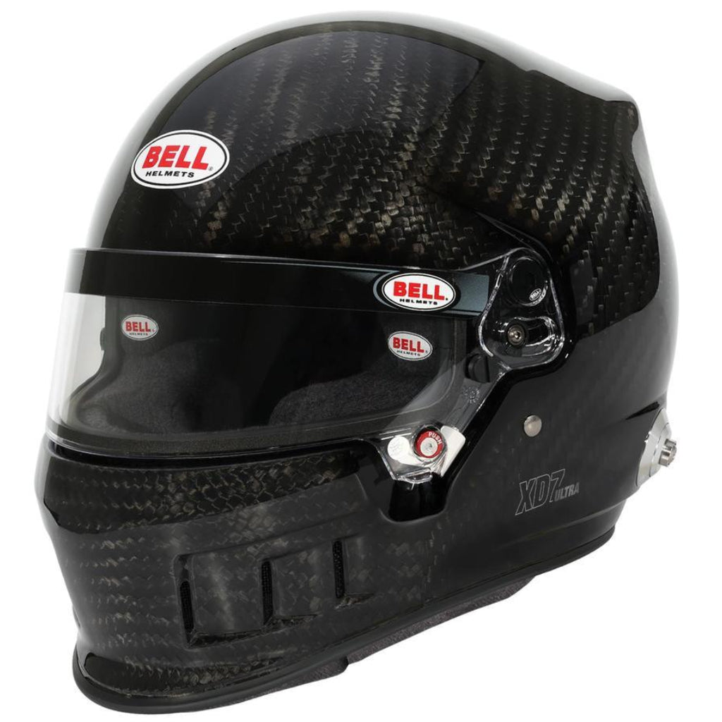 Bell XD7 Ultra carbon fiber racing helmet left side profile showing visor hardware and shell weave