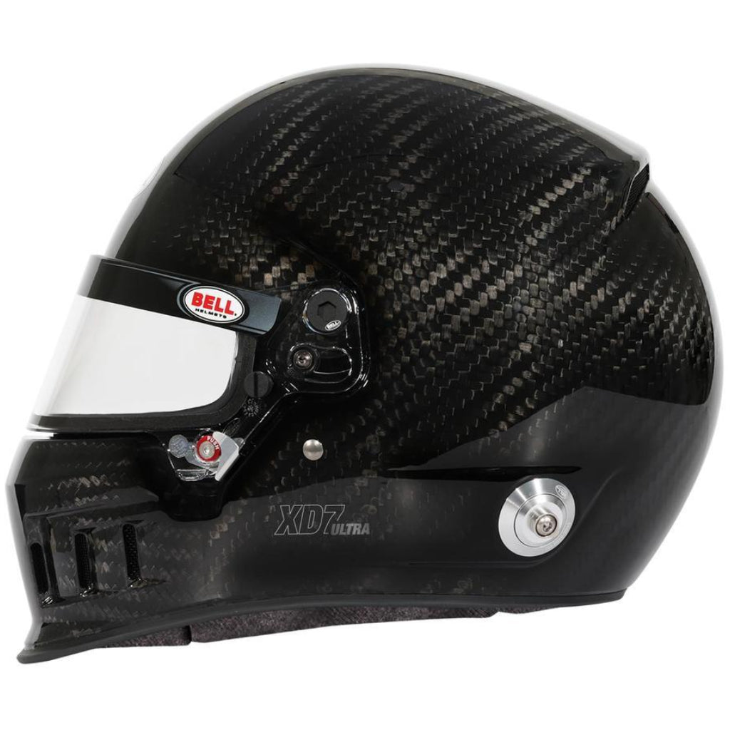 Bell XD7 Ultra carbon fiber racing helmet left side profile showing visor hardware and shell weave