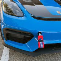 Thumbnail for Porsche Boxster Spyder with CMS Performance front tow strap mount and Sparco Red tow strap
