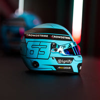 Thumbnail for Close-up of Bell Racing Helmets mini-helmet replica of George Russell 2025 F1 helmet