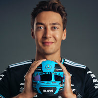 Thumbnail for George Russell holding Bell HP77 2025 Mini Helmet front view with PETRONAS branding visible