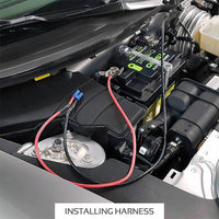 Thumbnail for Long 45-inch Antigravity clampless starting harness tucked near car cowl for jump-starting