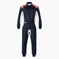 Thumbnail for OMP One S Race Suit navy and orange front view with white side panels on a clean white Shopify-ready background.