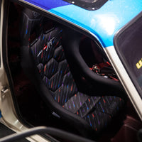 Thumbnail for OMP WRC-R Art Racing Seat side profile view installed in a car