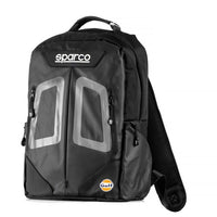 Thumbnail for Front view of the Sparco Gulf Stage Rucksack, showcasing reflective graphic panels, Sparco logo, and Gulf branding on a sleek black design.