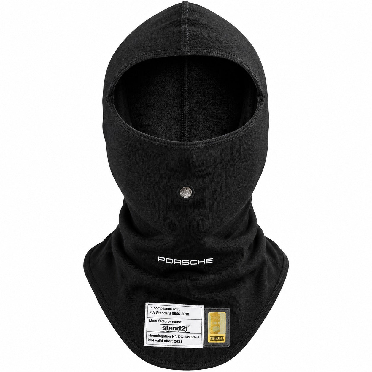 A black Stand21 Porsche Motorsport full-face balaclava hood with a neck gaiter, featuring a white Porsche logo on the chest and a white technical specification label near the bottom.  Created by Competition Motorsport