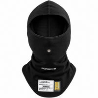 Thumbnail for A black Stand21 Porsche Motorsport full-face balaclava hood with a neck gaiter, featuring a white Porsche logo on the chest and a white technical specification label near the bottom.  Created by Competition Motorsport
