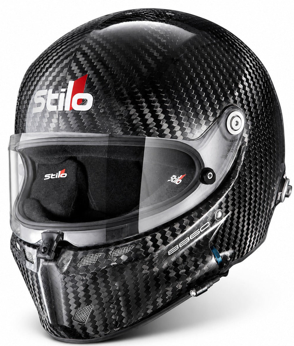 Stilo ST6 carbon fiber 8860 racing helmet with clear visor, exposed carbon shell, and integrated side port hardware